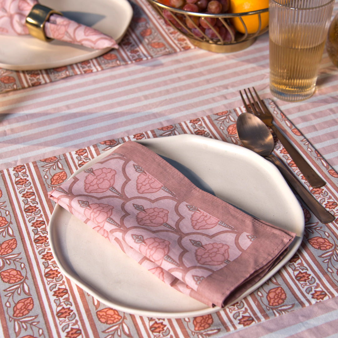 Gulshan tablecloth styled with plates and table décor for a dining setup

