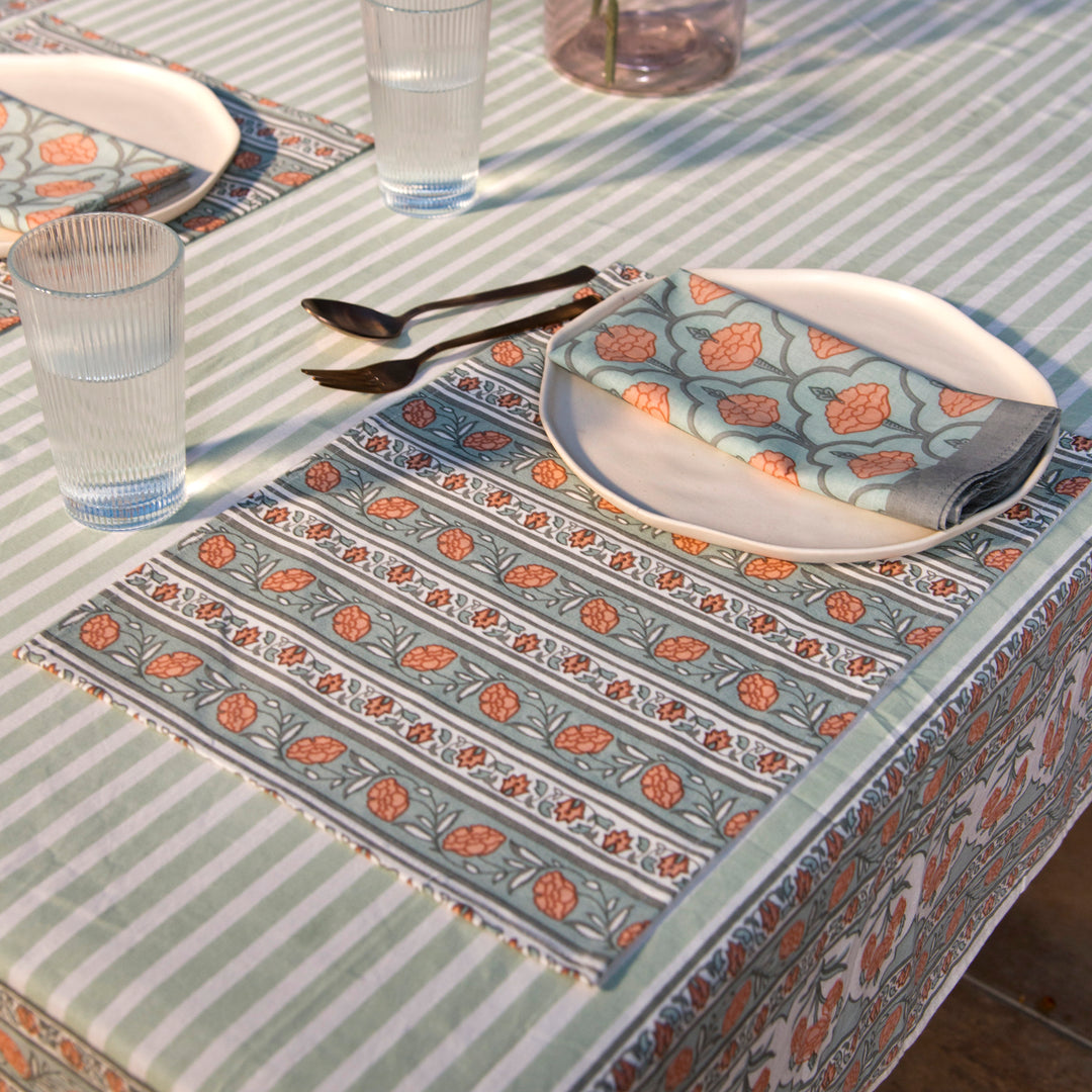 Gulshan table mats styled on dining table with plates and table décor