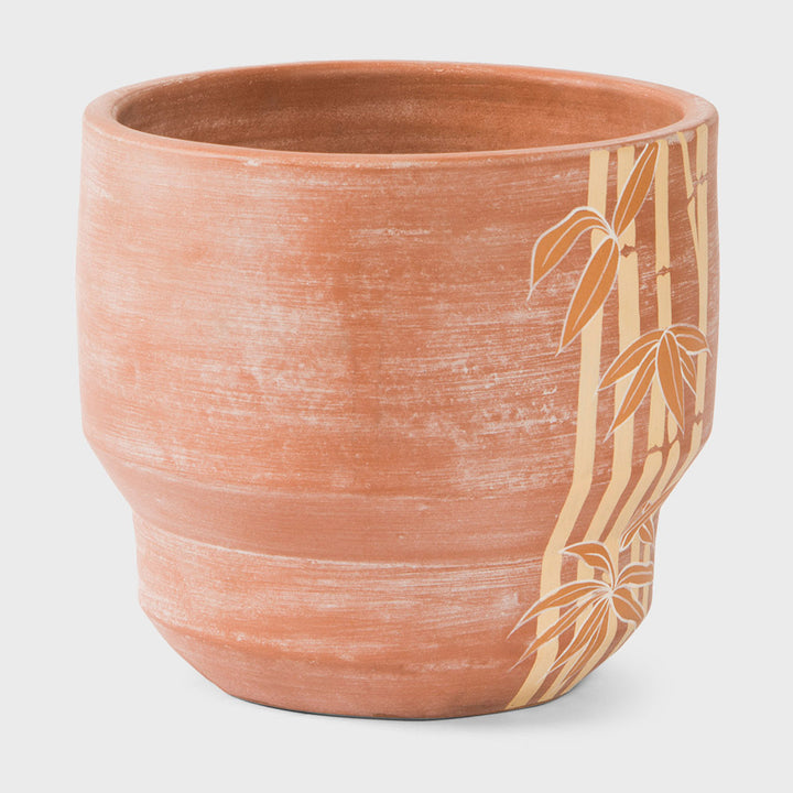 Hand painted bamboo grove terracotta 8.5 diameter planter with ochre and white leaves on a natural clay background  