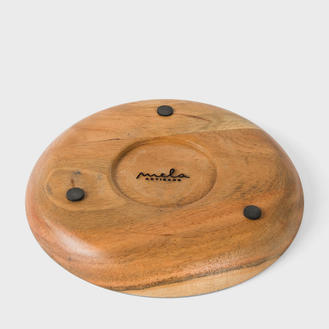  Close-up view of hand painted botanical leaf artwork and smooth natural acacia wood finish  