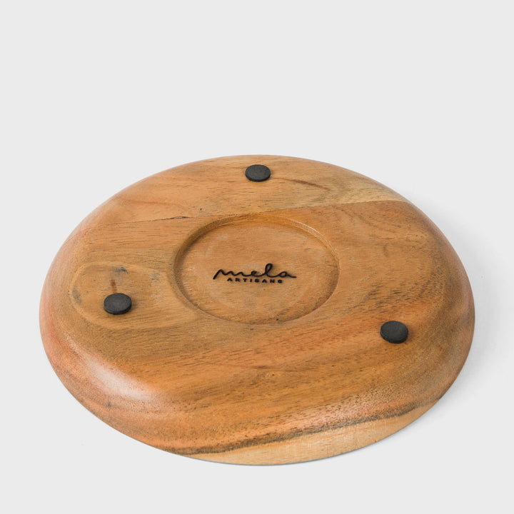  Close-up view of hand painted botanical leaf artwork and smooth natural acacia wood finish  