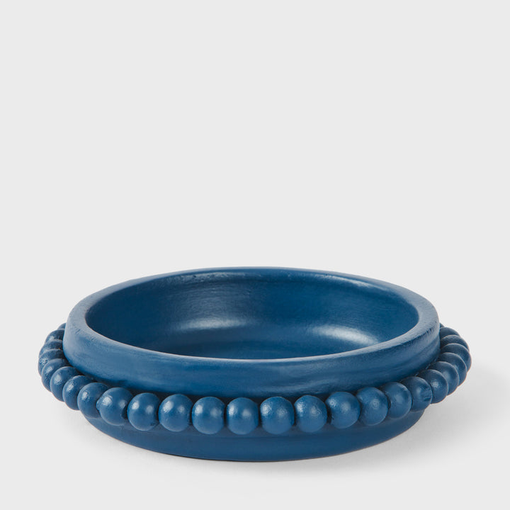 Handcrafted matte indigo terracotta soap dish with a sculptural raised beaded border by Mela Artisans.