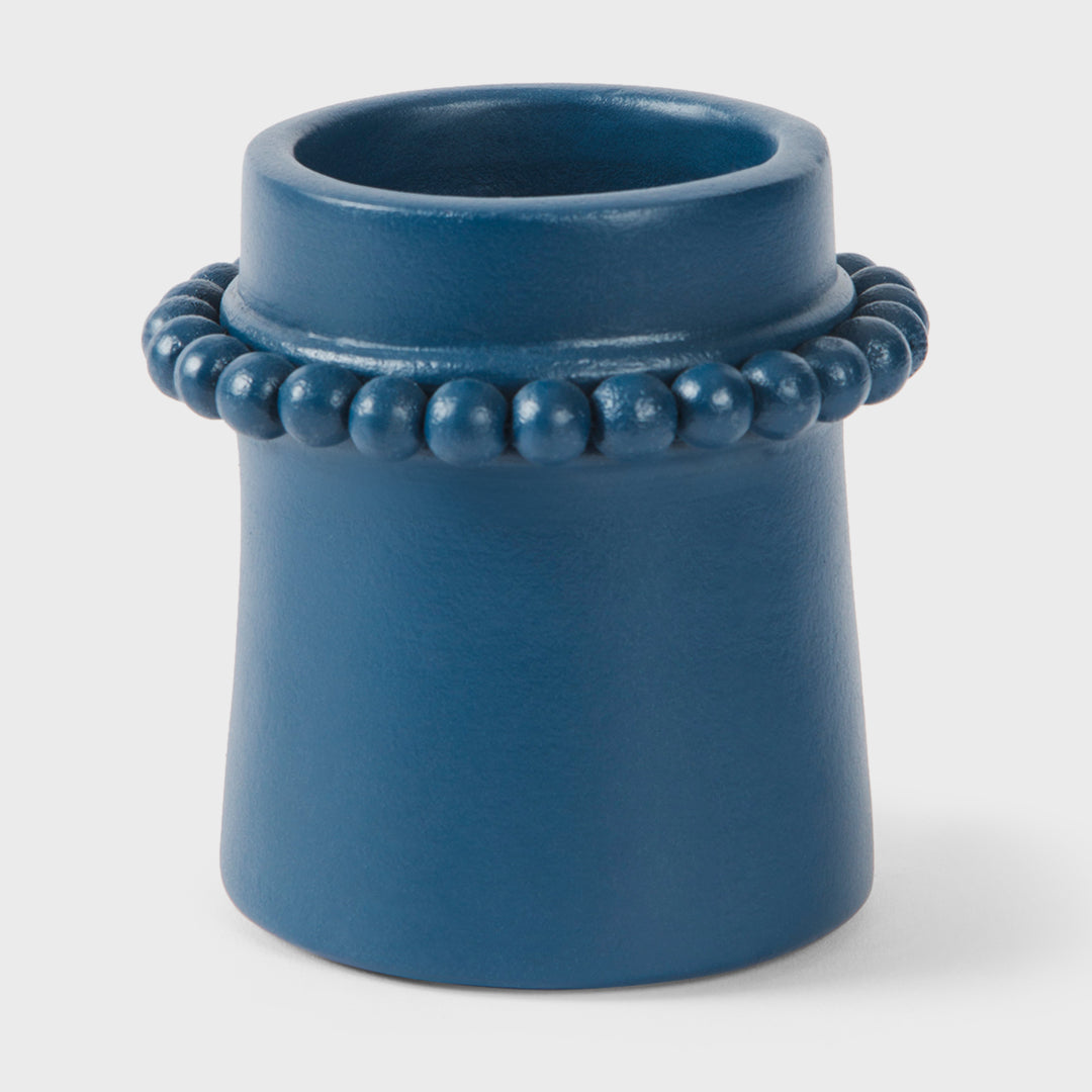 Handcrafted matte indigo terracotta toothbrush holder with sculptural raised beaded detailing by Mela Artisans.