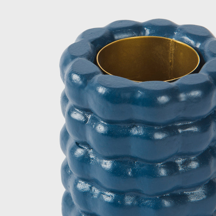 Close-up of the handcrafted terracotta utility holder highlighting its matte indigo glaze, stacked bubble texture, and hand-finished ceramic craftsmanship.