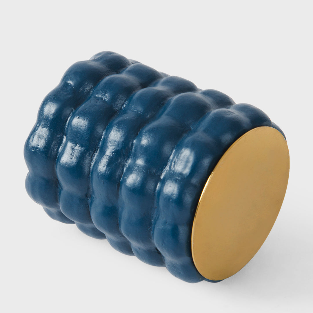 Close-up of the handcrafted terracotta utility holder highlighting its matte indigo glaze, stacked bubble texture, and hand-finished ceramic craftsmanship.