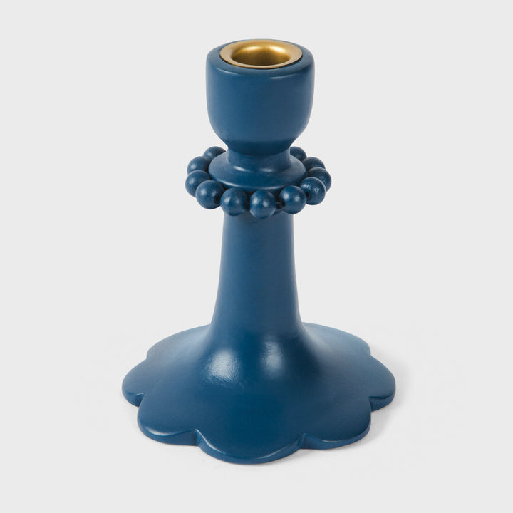 Handcrafted matte indigo terracotta taper 6" candle holder with raised bead detailing and scalloped base by Mela Artisans.