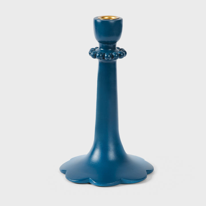Handcrafted matte indigo terracotta taper 9" candle holder with raised bead detailing and scalloped base by Mela Artisans.
