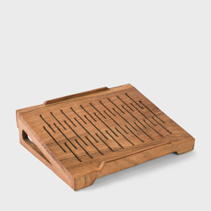  Hand carved natural acacia wood laptop stand with sloped ventilation slots on white background  