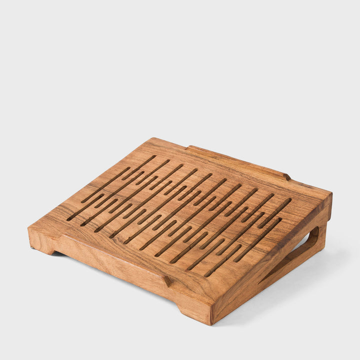  Hand carved natural acacia wood laptop stand with sloped ventilation slots on white background  