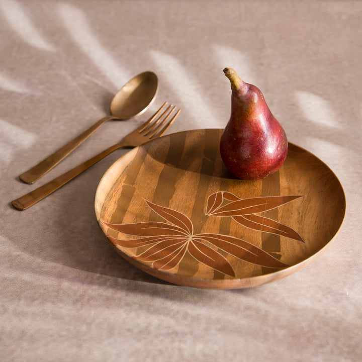 Pair of Bamboo Grove wood plates styled on a dining table serving appetizers and bread