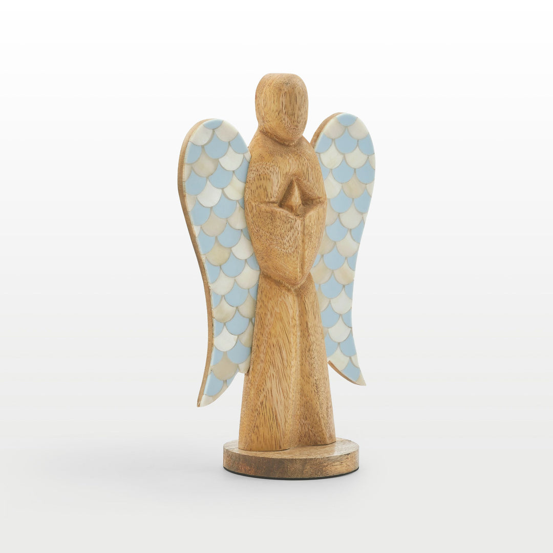 Close-up of hand-carved wooden angel body and scalloped teal and white bone inlay wing pattern
