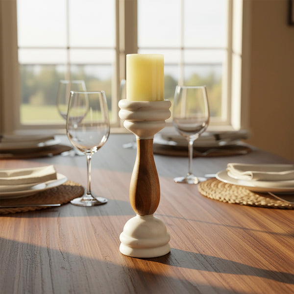 black pillar candleholder styled on table with candle
