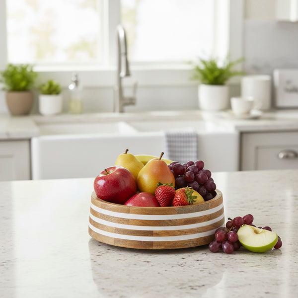 Small white-striped mango wood bowl filled with fresh strawberries and grapes for healthy snacking.