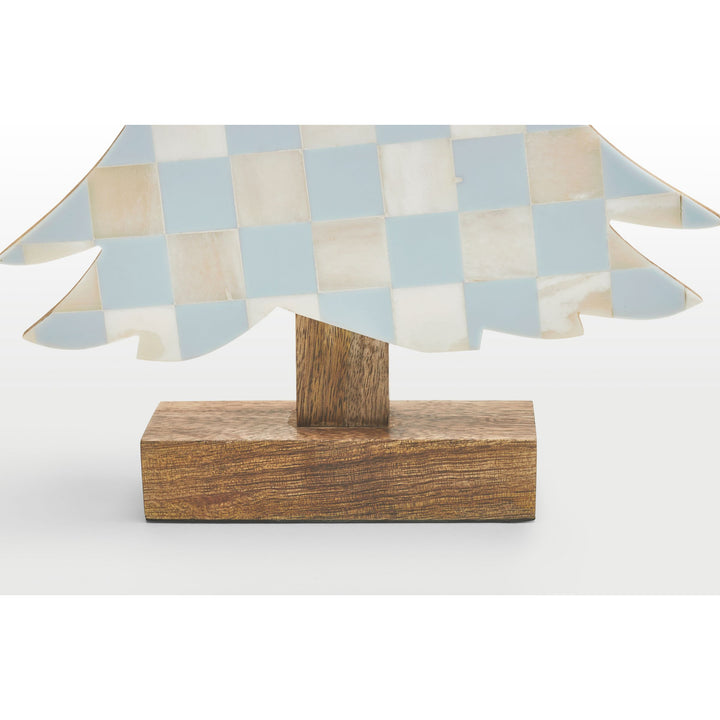 Close-up of handcrafted teal blue resin and white bone inlay checkered pattern texture