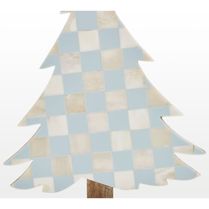 Close-up of handcrafted teal blue resin and white bone inlay checkered pattern texture