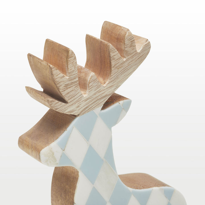 Close-up of handcrafted teal resin, white bone inlay diamond pattern, and natural wooden antlers