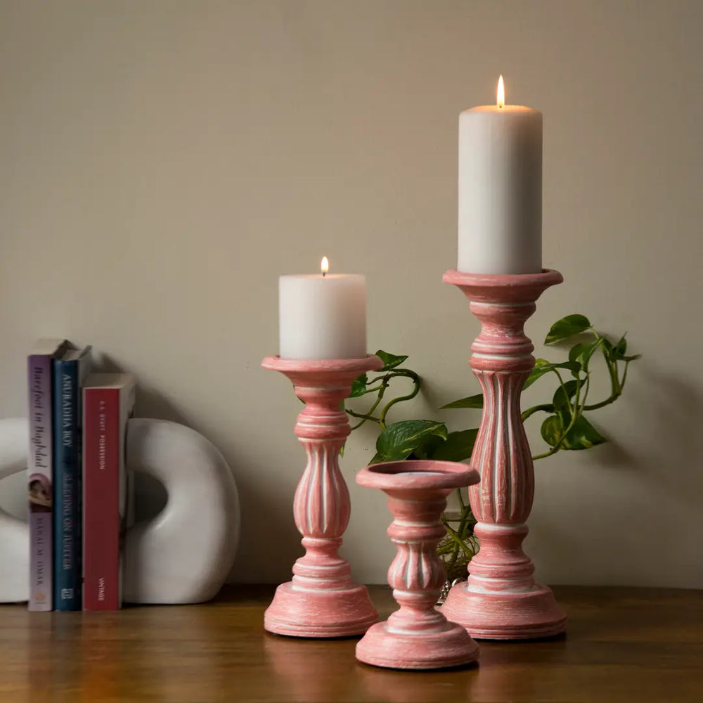 close-up of soft pink finish on candleholders
