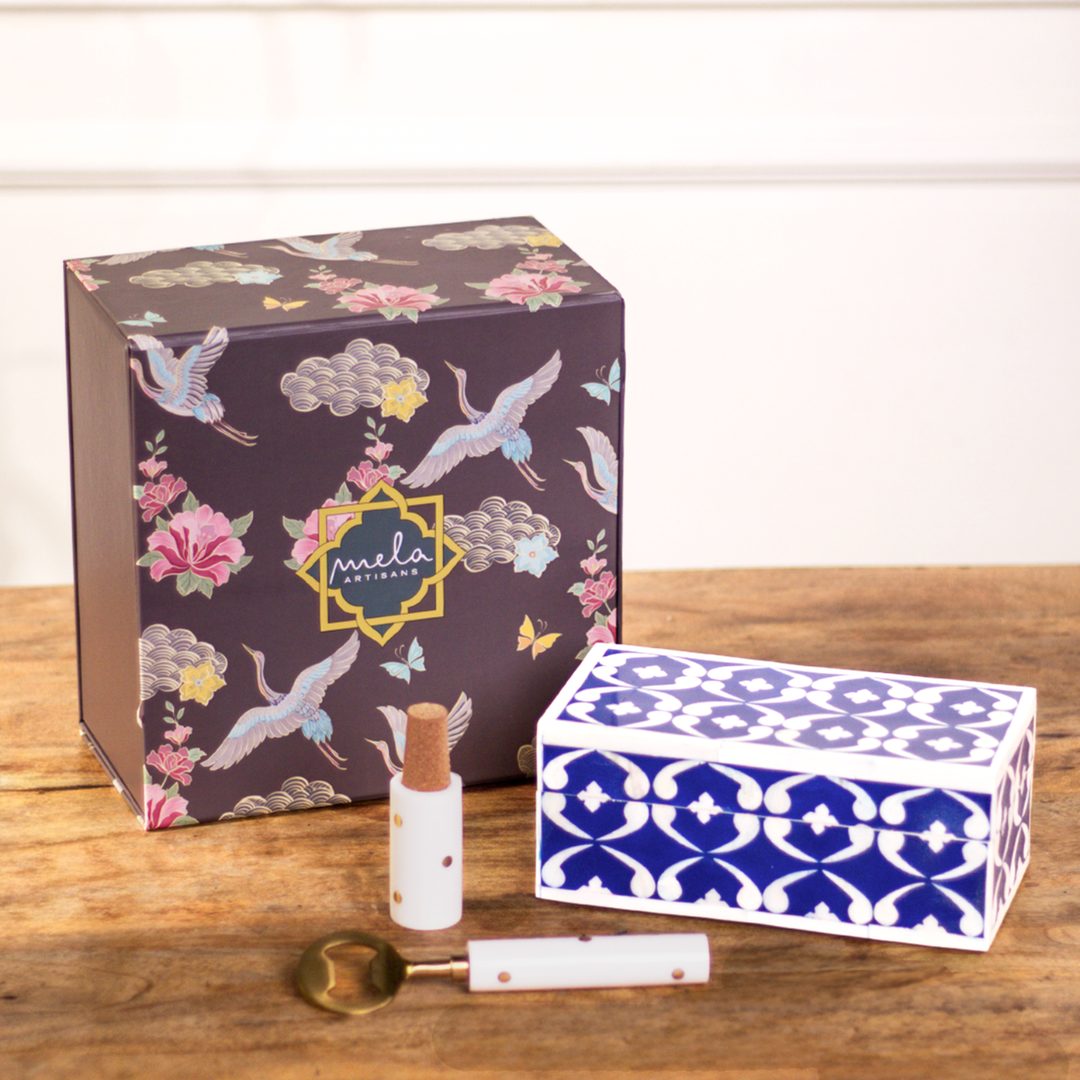 Lattice blue gift box with bottle opener and stopper set displayed together
