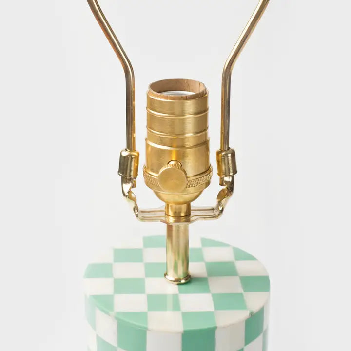 Close-up of mint and ivory checkered bone inlay pattern