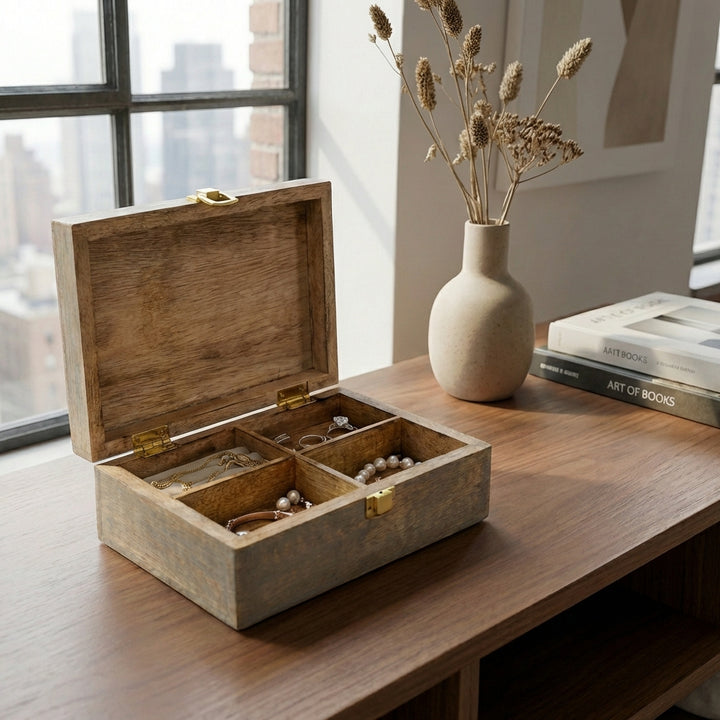 4 compartment handcrafted mango wood memory box styled on dresser with jewelry and keepsakes