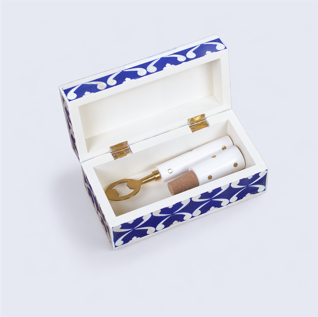Close-up of lattice blue pattern on box and metal bar tools
