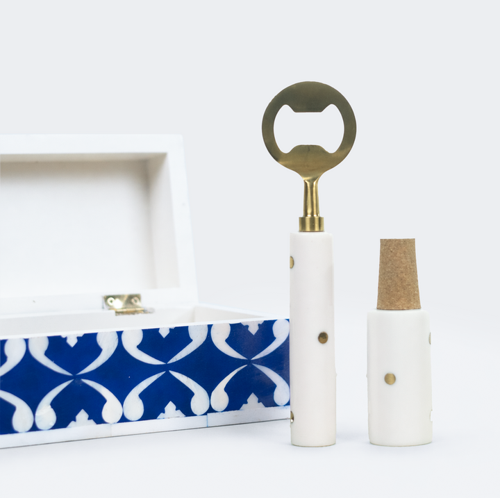 Close-up of lattice blue pattern on box and metal bar tools