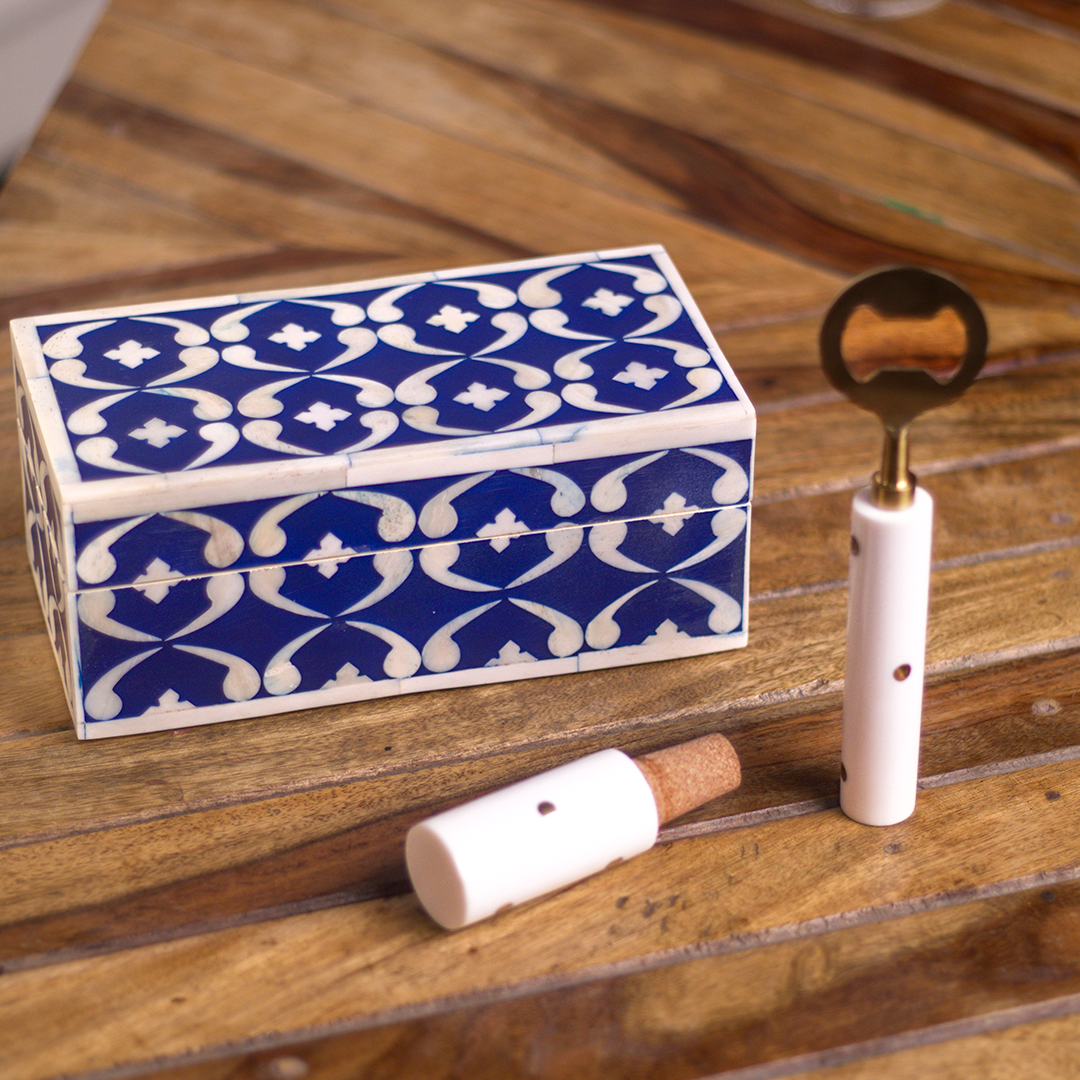 Close-up of lattice blue pattern on box and metal bar tools