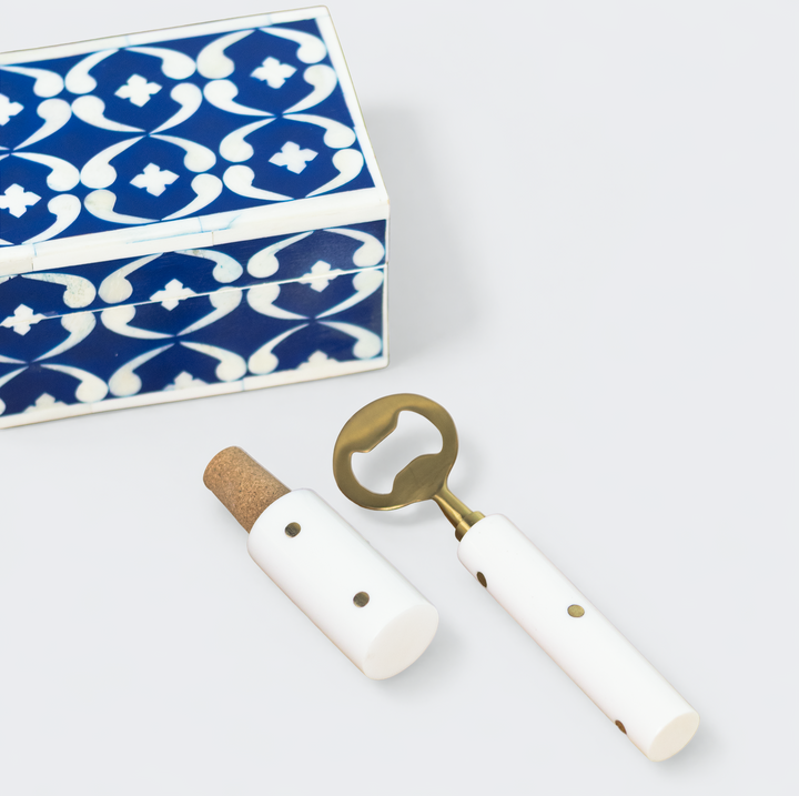 Close-up of lattice blue pattern on box and metal bar tools