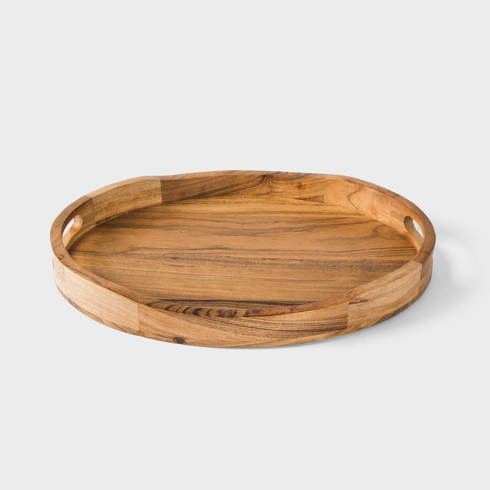 Natural acacia wood oval serving tray with carved cutout handles