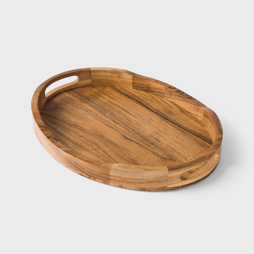 Natural acacia wood oval serving tray with carved cutout handles