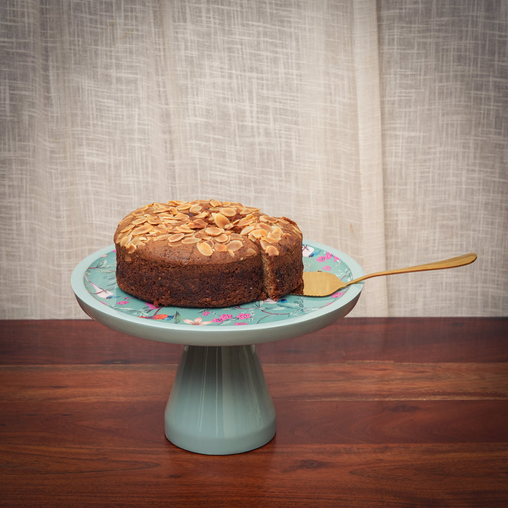 Bird's-eye view of the intricate Aqua Flora enamel design on a 12-inch round cake stand.