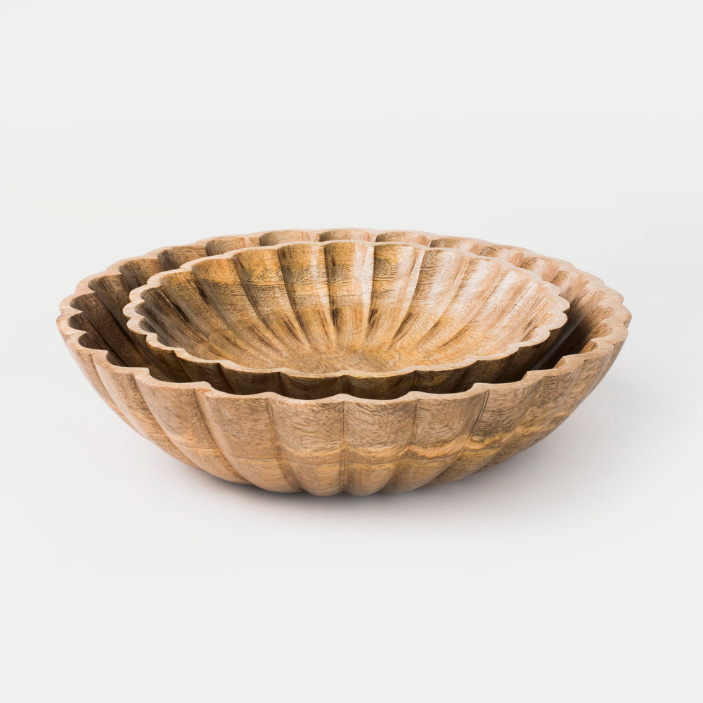 Set of two hand-carved scalloped mango wood bowls nested together