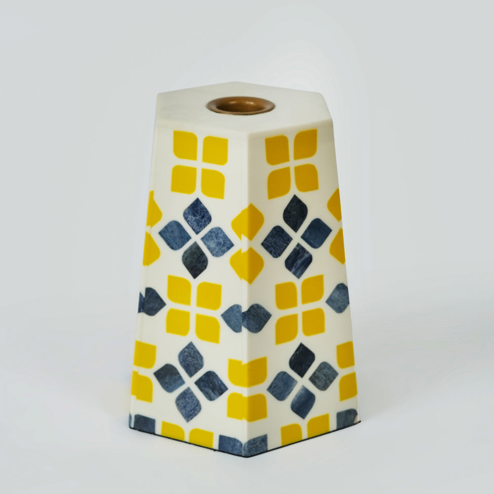Handcrafted Marigold Mosaic bone inlay candleholder featuring a yellow floral pattern on a white background.

