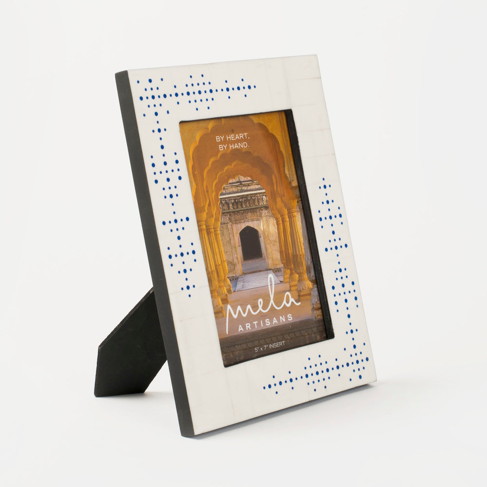 Handcrafted Perfora bone photo frame with blue dot detailing