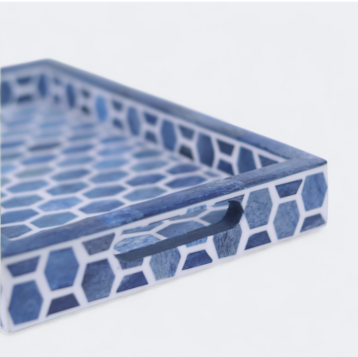 Close-up of tray surface and matching coaster design