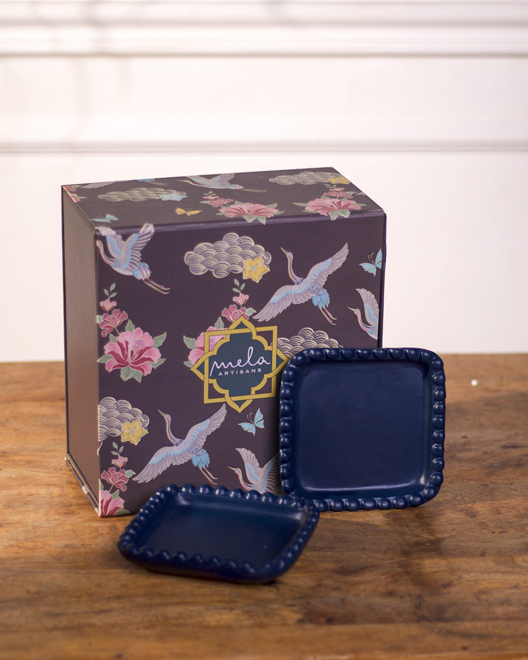  Close-up of beaded edge design and indigo finish on handcrafted terracotta tray