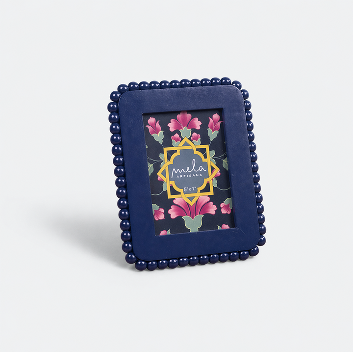  Close-up of handcrafted beaded detailing on photo frame from Raatriti collection