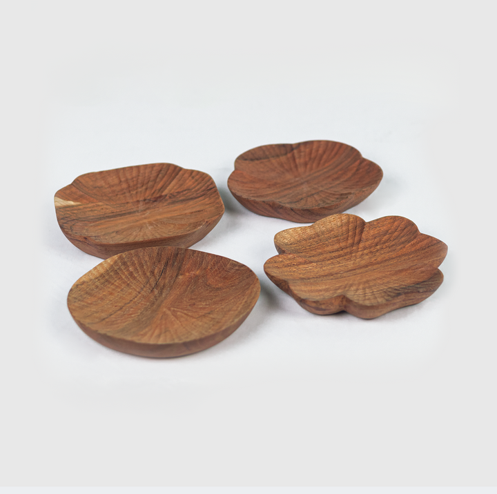 Close-up of hand-carved wood texture and natural grain on trinket tray