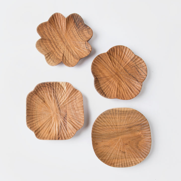 Hand carved wood trinket trays set of 4 in floral and scalloped shapes on white background  