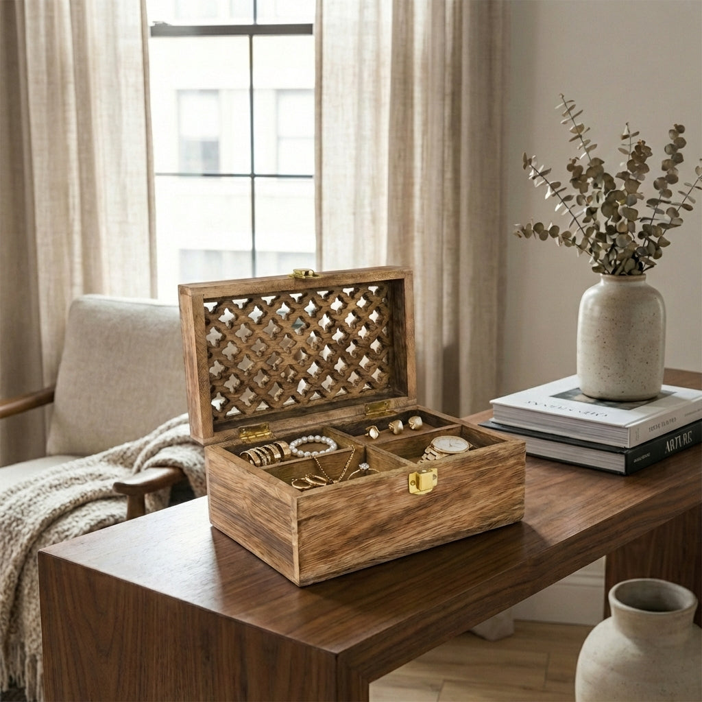 handcrafted mango wood trellis memory box with four partitions styled on dresser with jewelry and tea
