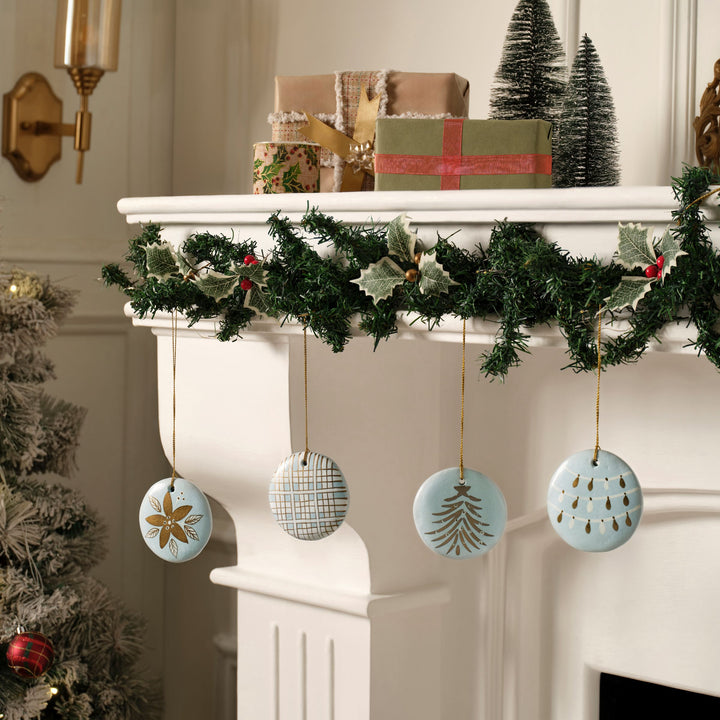 Blue Frost handcrafted Christmas ornaments decorating a festive holiday tree