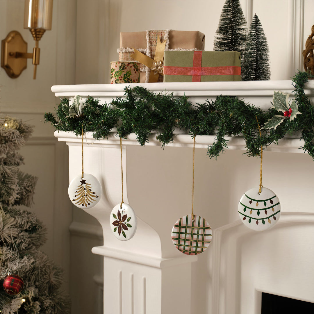 White Frost handcrafted Christmas ornaments decorating a festive holiday tree