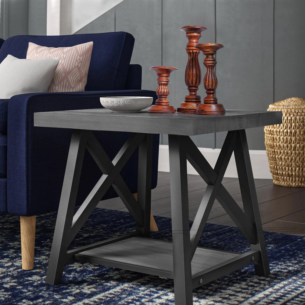 wooden candleholder set styled on table with candles